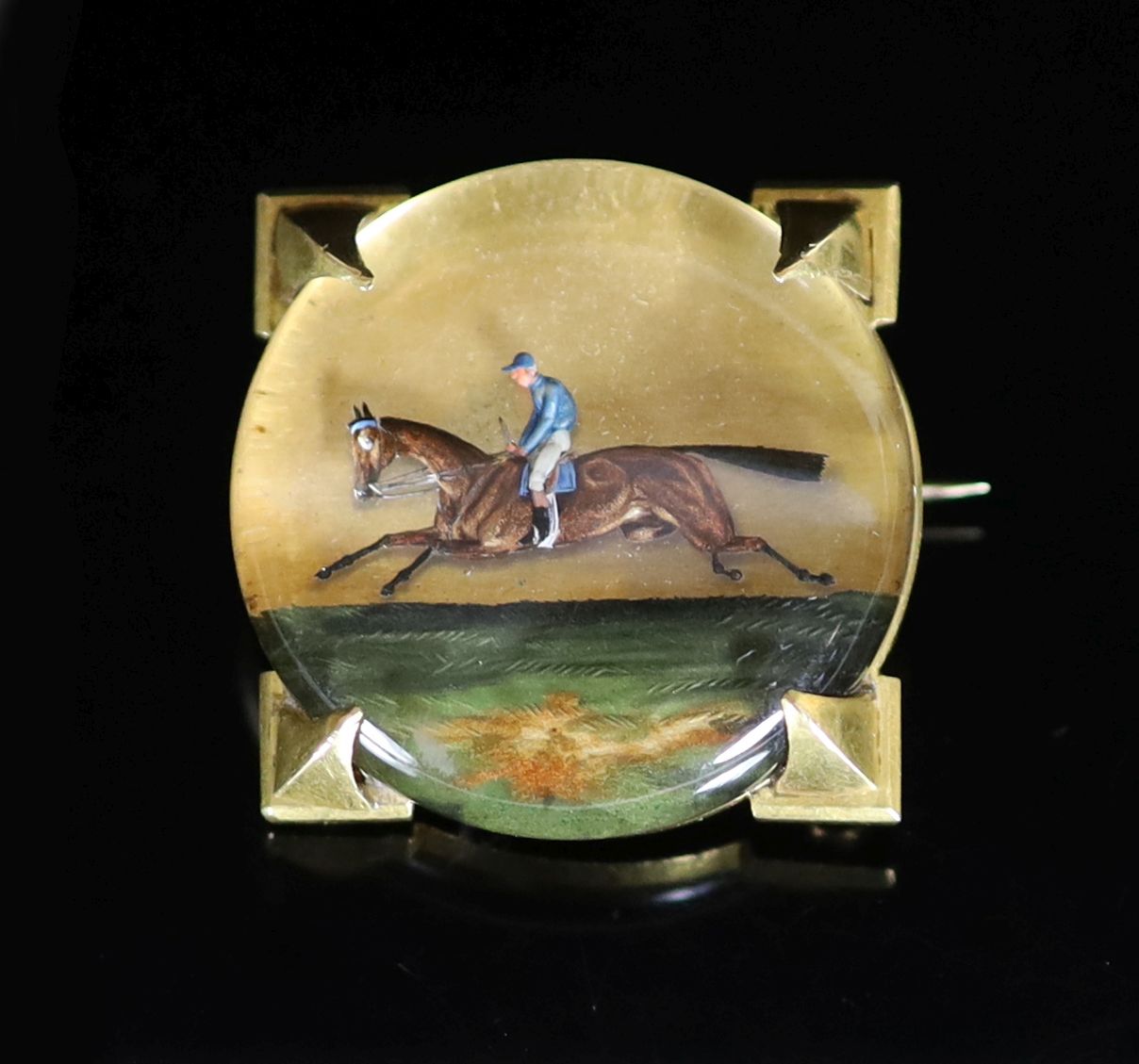 A late 19th century French 18ct gold and Essex crystal brooch decorated with a racehorse, see lot for related items